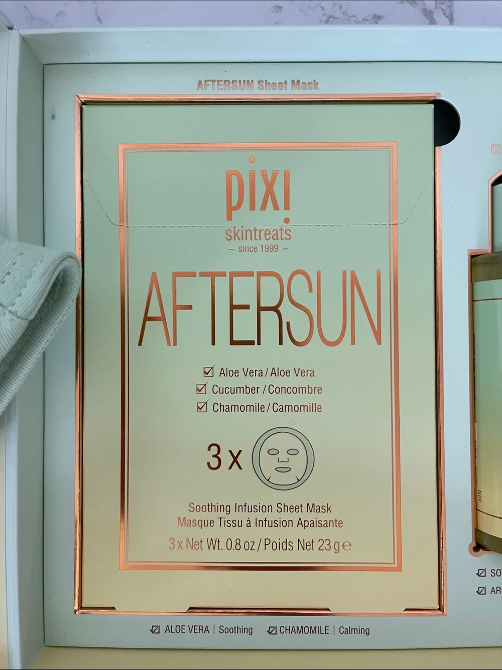 Pixi AfterSun Skincare Set with Mint Green Hat and Cleansing Oil